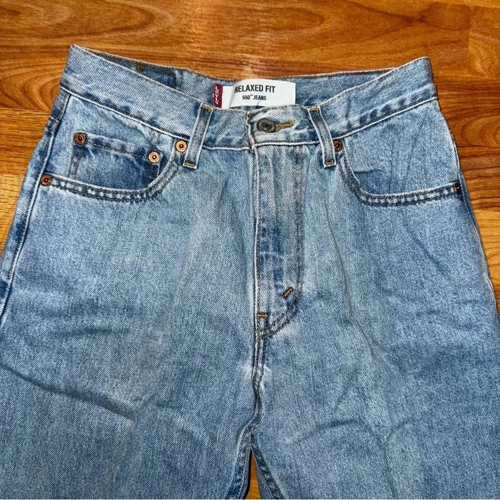 LEVI STRAUSS & CO 550 MEN'S LIGHT BLUE RELAXED FIT JEANS 29 X 32 100% Cotton